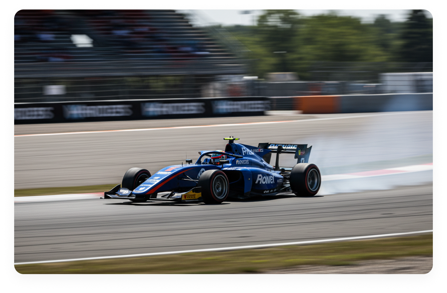 Blue open-wheel race car speeding around a track